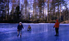 View: ct09739 Skating on Ratherheath Tarn near Kendal