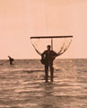 View: ct11621 A Shrimp Net Fisherman with his Net