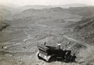 View: ct12430 A Car descending Hardknott Pass into Eskdale